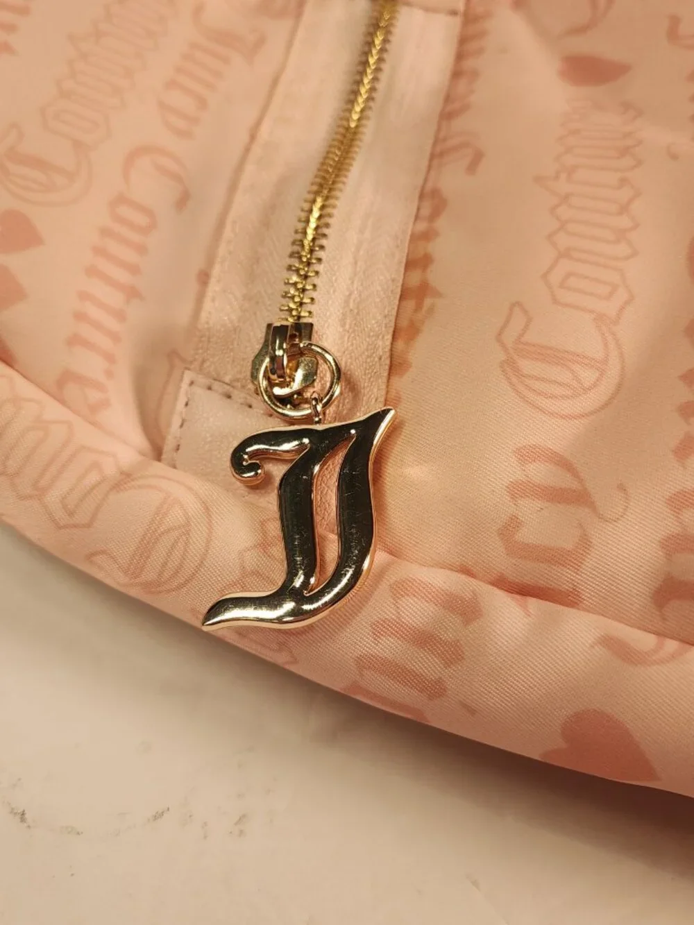 NWT Juicy Couture Material Girl Sling Backpack in Powder Blush